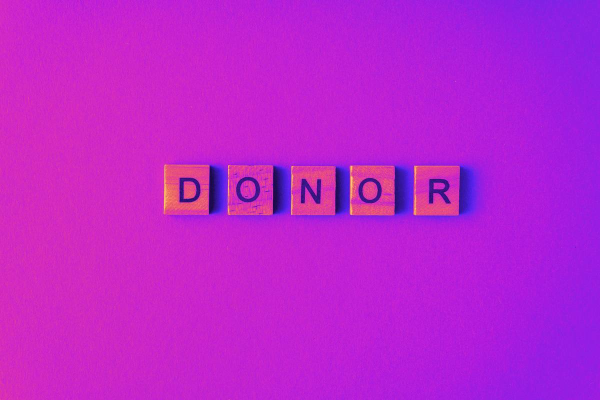 Letter tiles spelling donor